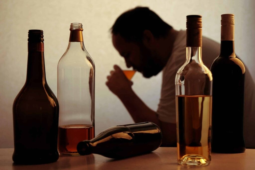 A man wondering how long does alcohol rehab last.