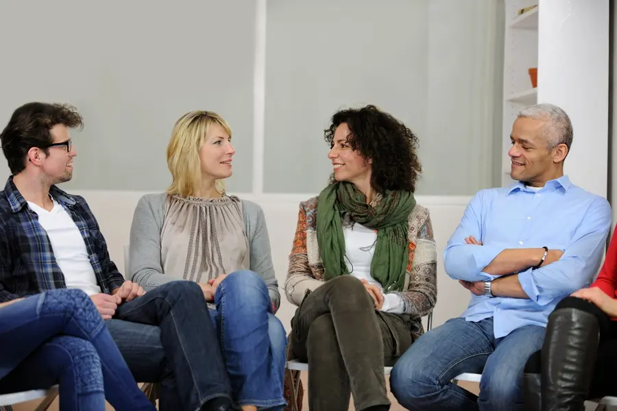 Group therapy session for alcohol addiction treatment
